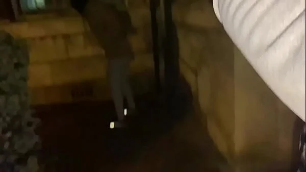 Woman on street gets offered a cigarette to flash and piss in public