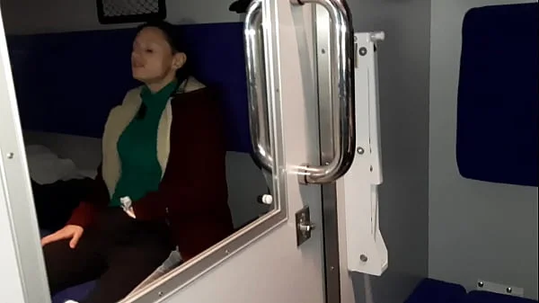 A stranger and a fellow traveler and I cum in a train compartment -