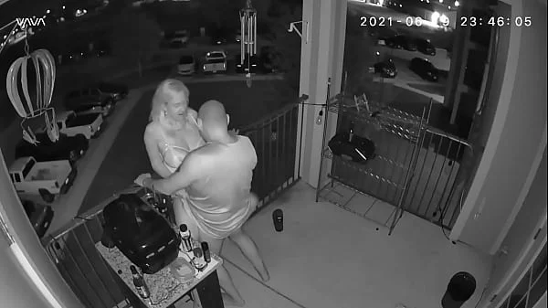 Couple caught on the balcony