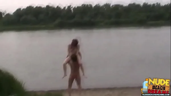 Real amateur swingers sharing their wives right on a public beach
