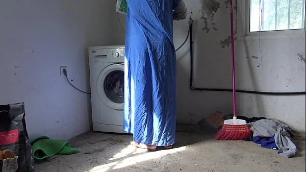 A Muslim maid is fucked doggystyle while doing the laundry