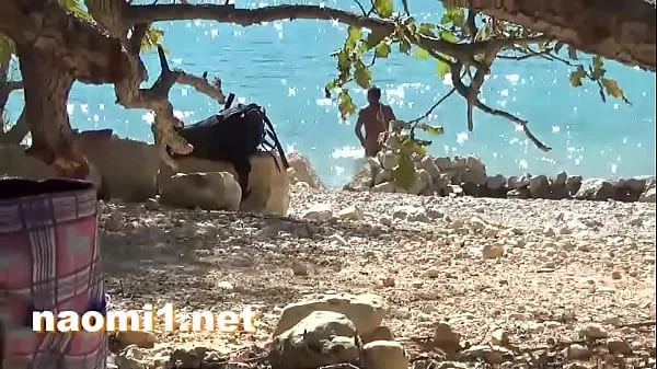 Public beach pissing and masturbate for Naomi