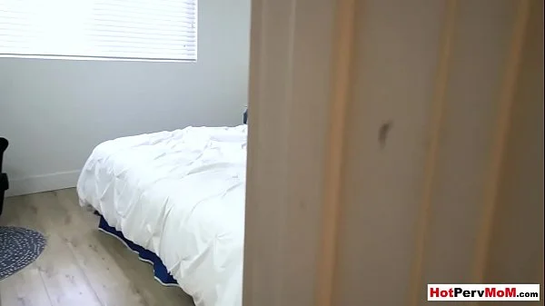 MILF stepmother fingering herself in front of stepson