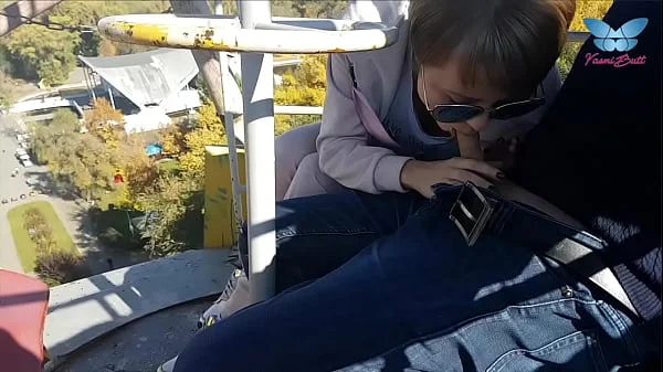 Public blowjob on the ferris wheel from shameless whore